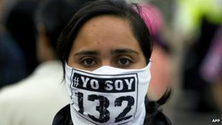 A member of the #YoSoy132 movement takes part in a protest outside the Federal Electoral Institute on 10 July