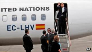 UN chief Ban Ki-moon waves after landing at Pristina airport, 24 July