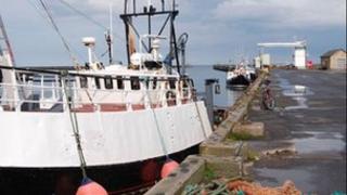 Fishing boats docked on Amble's quayside