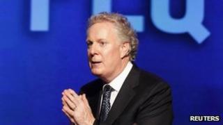 Quebec's premier Jean Charest speaks at a rally in his riding of Sherbrooke, Quebec, 31 July 2012