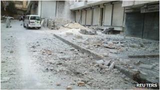 Damaged shops and rubble in Aleppo, Syria (1 August 2012)