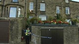 Police outside the house in Haworth