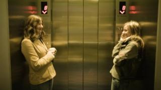 Two women in a lift
