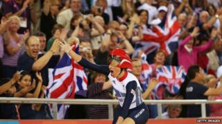 Sarah Storey takes a lap of honour in the velodrome