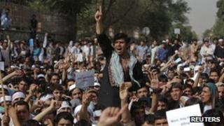 Afghan protesters shout slogans during a demonstration in Kabul on Sunday