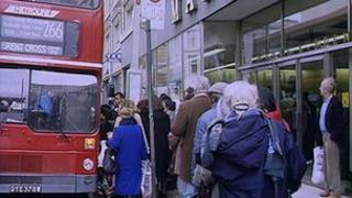 Older people getting on a bus