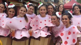 Girls dressed up as cakes