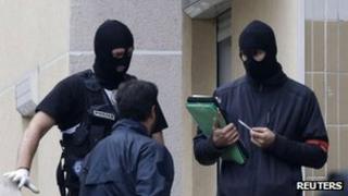 Masked police in Torcy, Paris