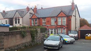 Police and fire service near the scene of the fire