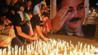Lebanese mourners light candles during a vigil for Brig. Gen. Wissam al-Hassan and at least seven others who were killed in a Friday bomb attack in Beirut