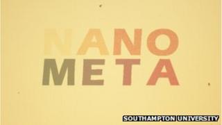A piece of gold with the words Nano Meta written on it in colours