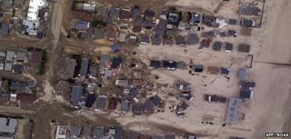 Satellite image of damaged properties (Image: AFP/NOAA)