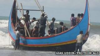 Some survivors of the capsized boat off Bangladesh