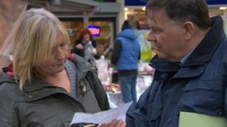 BBC's Len Tingle explains the voting system to shoppers in Barnsley