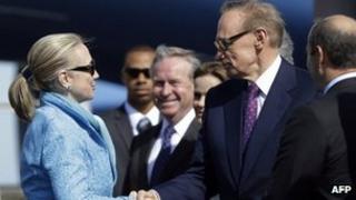 Hillary Clinton shakes hands with Australian Foreign Minister Bob Carr in Perth on 13 November 2012
