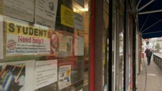 adverts in shop window