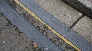 Double yellow lines painted black
