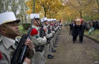 King Zog's remains are carried from his grave at Thiais, south of Paris, 14 November