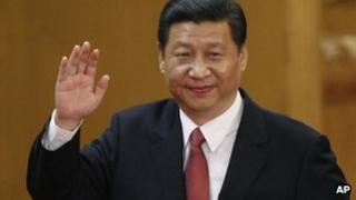 New Communist Party General Secretary Xi Jinping waves in Beijing's Great Hall of the People, 15 Nov 2012