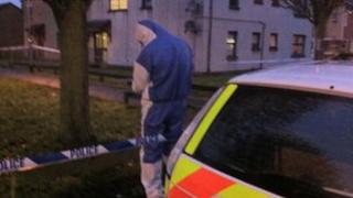 A police forensic officer at the scene