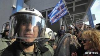 Anti austerity protesters argue with police in Thessaloniki