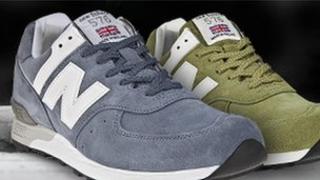 New Balance training shoes with small union jacks attached