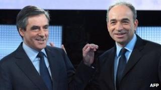 Francois Fillon (left) and Jean-Francois Cope at a televised debate in Paris, 25 October