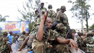 M23 rebels patrolling Goma, in eastern DR Congo, on 20 November 2012