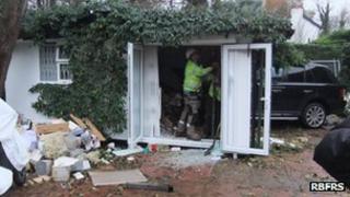Range Rover crashed into house