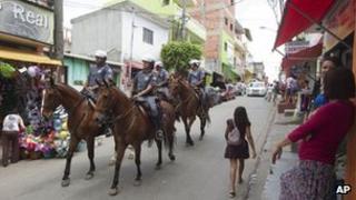 Police patrol in the Paraisopolis slum in Sao Paulo, Brazil, 19 November 2012
