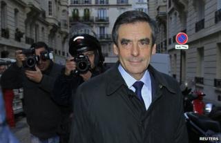 Francois Fillon leaves his apartment in Paris, 27 November