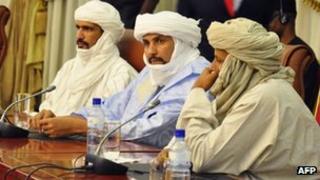 Algabass Ag Intalla (centre), leader of the Ansar Dine delegation, attends a mediation meeting with members of the Malian government and Tuareg rebels, hosted by Burkina Faso's president in Ouagadougou, 4 December 2012