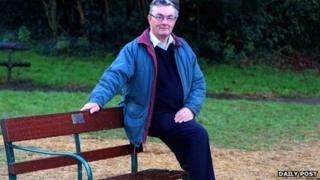 Dennis Bannister sitting on the memorial bench