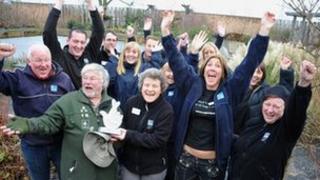 Bill Oddie presents the award to staff at Saltholme