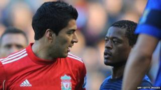 Luis Suarez and Patrice Evra