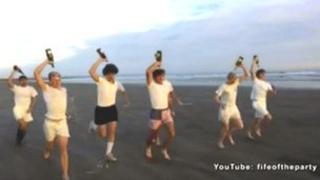 The students running along the West Sands to mimic the opening scene of Chariots of Fire