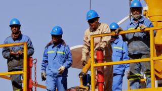 Workers at Ghori cement works in Afghanistan's Baghlan province