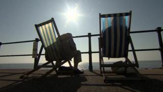 Sunny scene with deck chairs