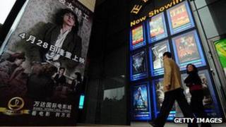 Cinemagoers arrive at Wanda International Cinemas in Beijing