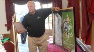 Peter Barrell auctioning a signed England shirt