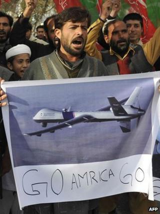 Supporters for Imran Khan, the cricketer turned politician, protest against drones