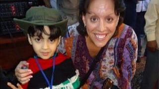 Lisa Gibson with a child in Libya