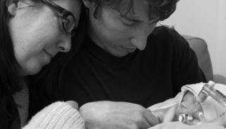 Parents with their child