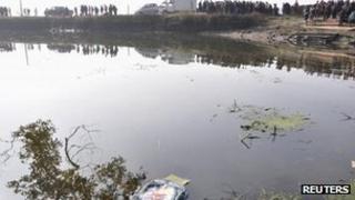 The pond in which the van crashed in Jianxi province, China
