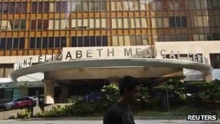 A man walks past the Mount Elizabeth Medical Centre where Indian gang-rape victim will undergo treatment in Singapore December 27, 2012