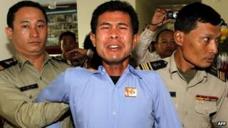 Born Samnang (centre) in court on 27 December 2012