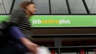 worker passing job centre