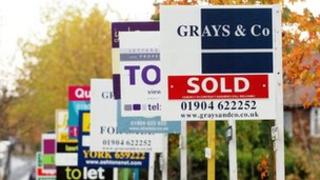 Estate agent signs