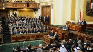 President Mohammed Morsi addresses the Egyptian upper house of parliament