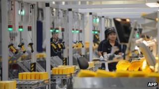 A worker in a factory in Singapore